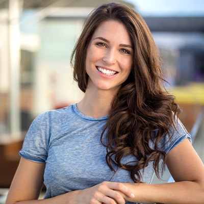 Woman smiling after learning cost of cosmetic dentistry in Rockwall